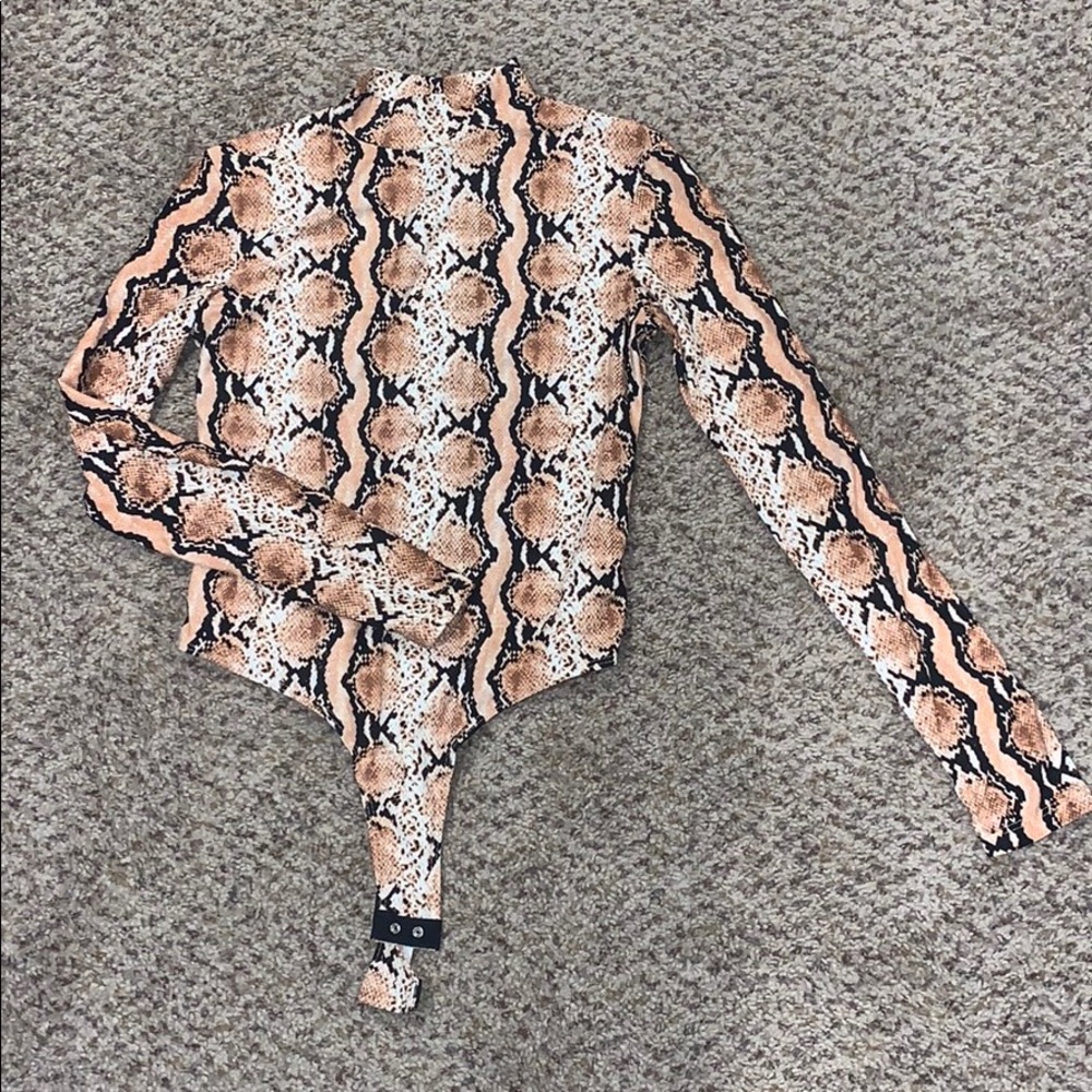 Peach snake print body suit